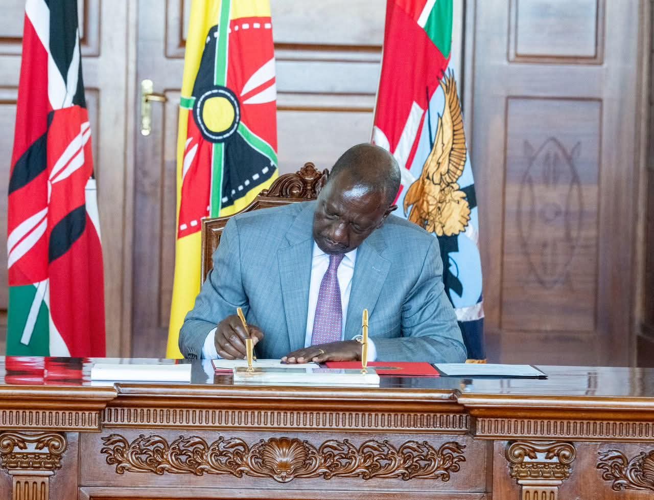 Ruto signs three bills into law